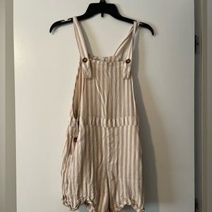 peach and white romper with pockets